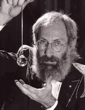 Gregory using a crystal ball during intuitive readings
